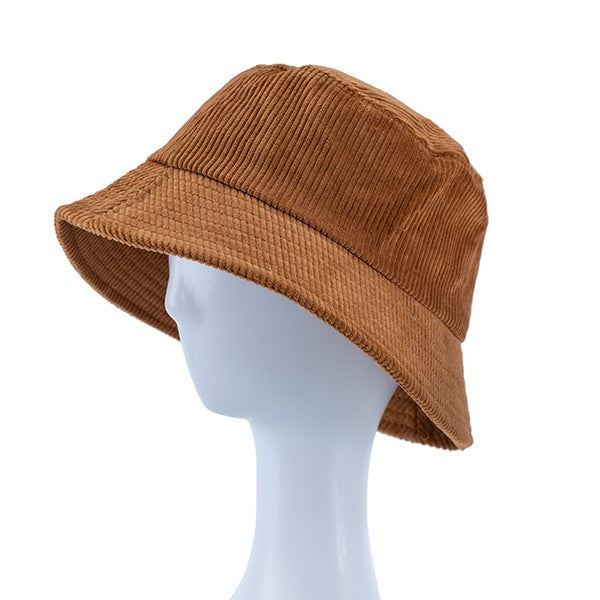 Brown bucket hat on a mannequin head against a white background