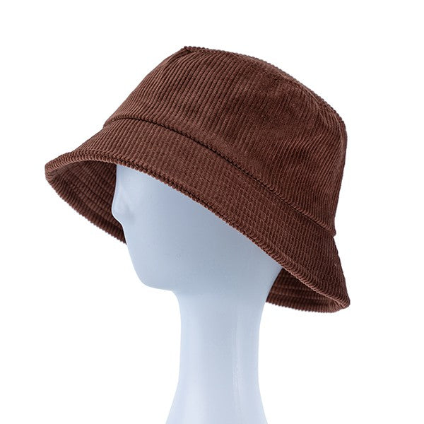 Brown bucket hat on a mannequin head against a white background