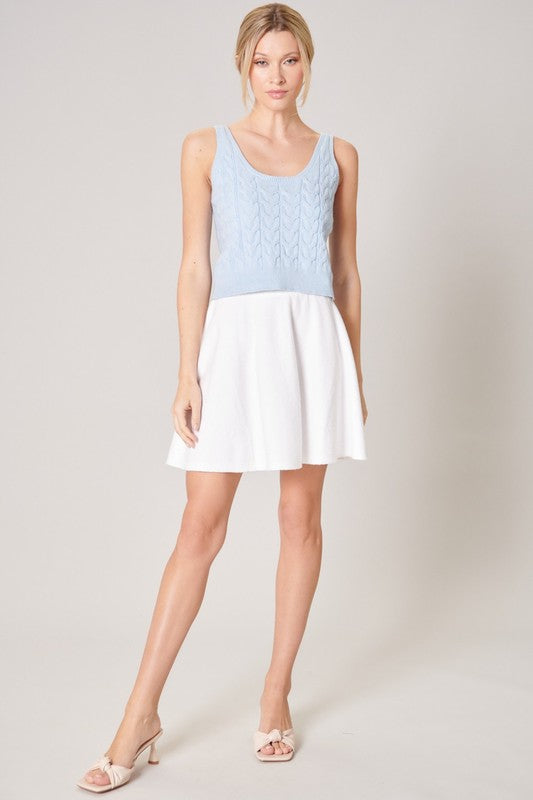 Light Blue Cable Knit Tank Top Boxy Fit with a Scoop Neckline and Cropped Fit.