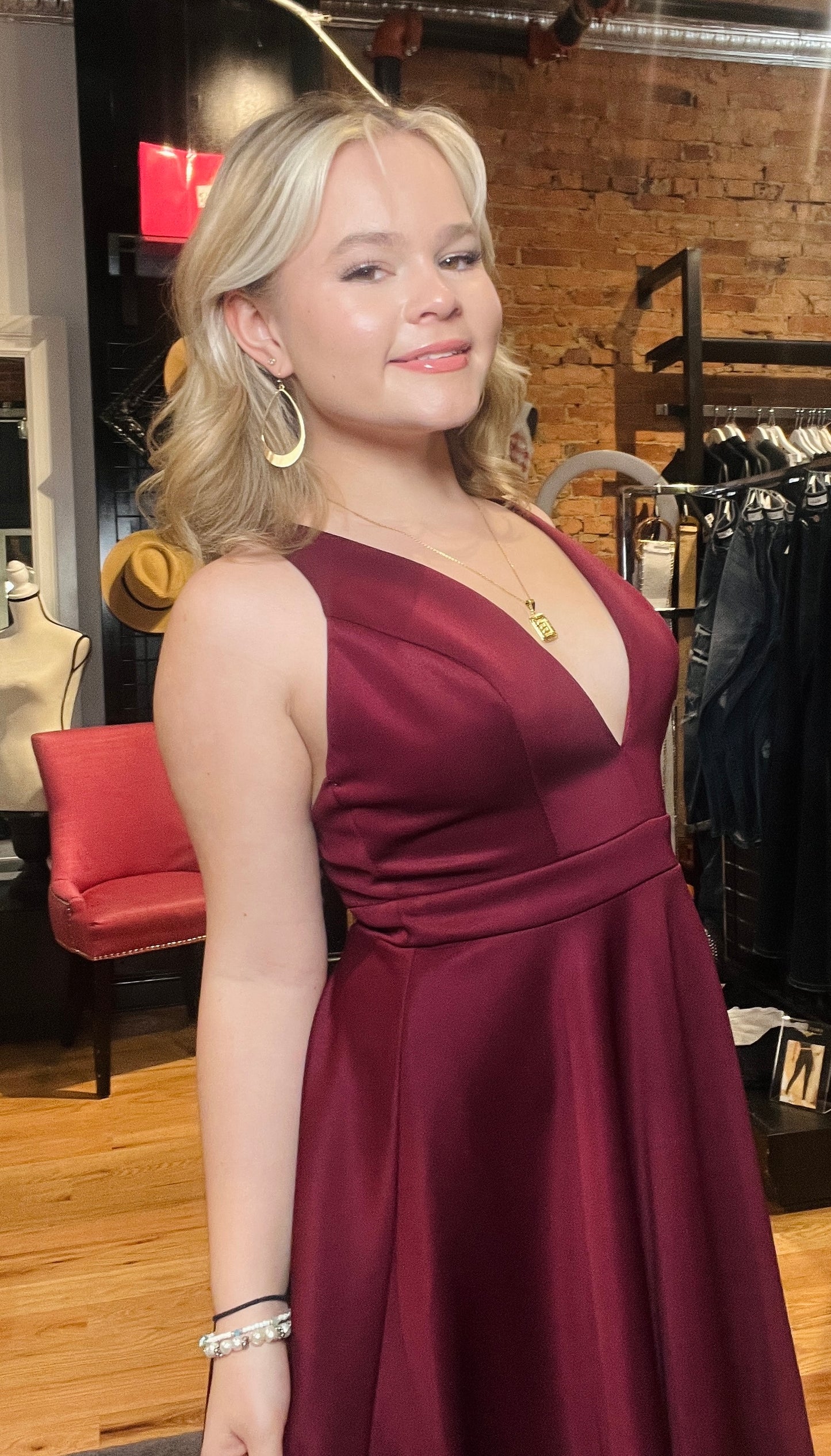 Wine Sleeveless Deep V Neckline Dress with Cut out Back and 100% Polyester.