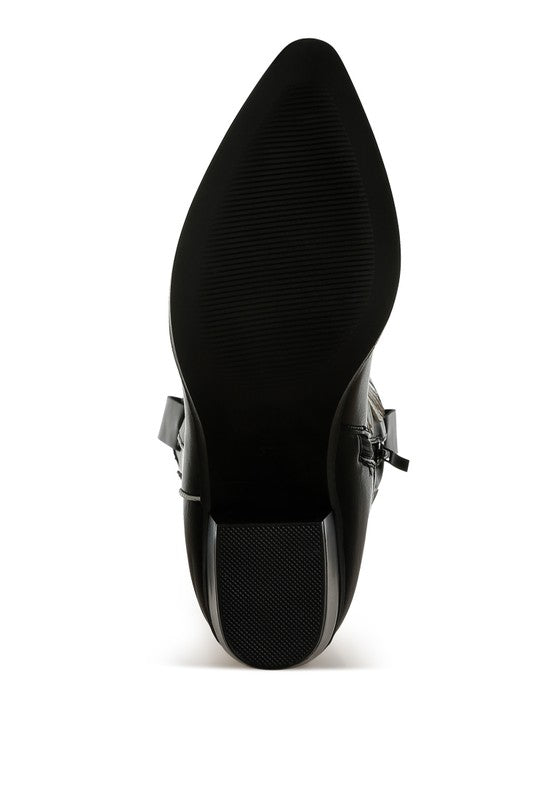 Black pointed-toe shoe on a white background