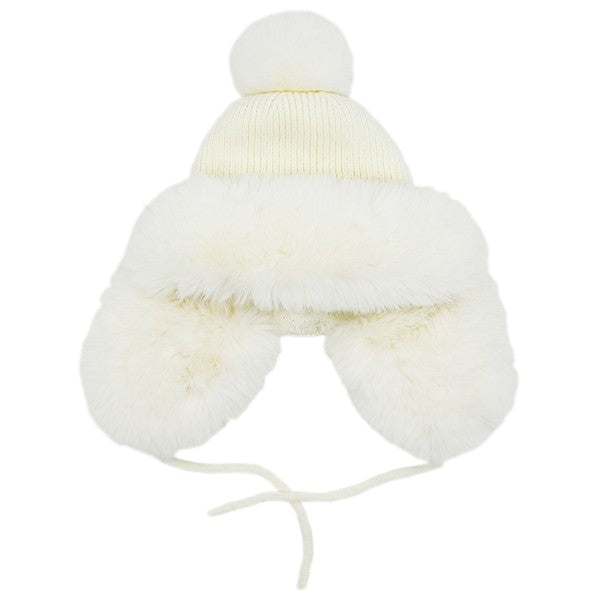 White winter hat with fur trim and pom-pom on a white background