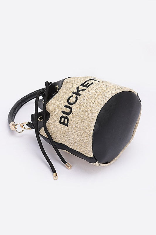 Black and beige drawstring pouch with 'Buckley' branding on a white background