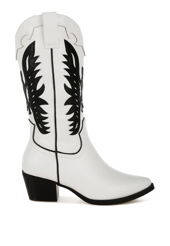 White cowboy boots with black designs on a white background