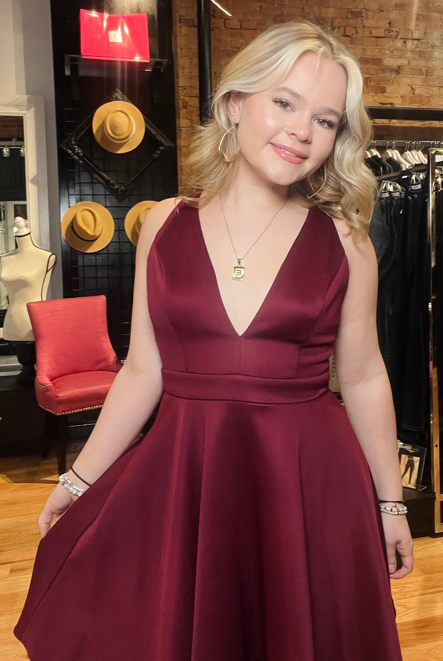Wine Sleeveless Deep V Neckline Dress with Cut out Back and 100% Polyester.