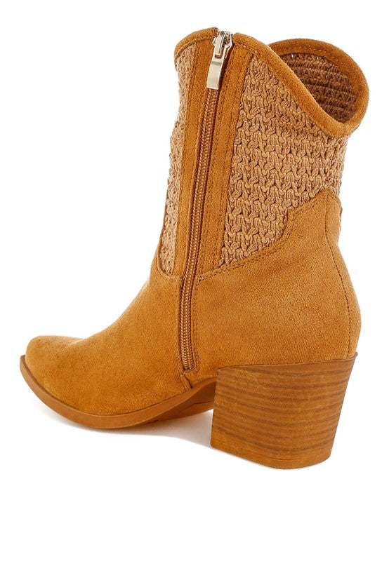 Tan ankle boot with textured side panel and zipper on a white background