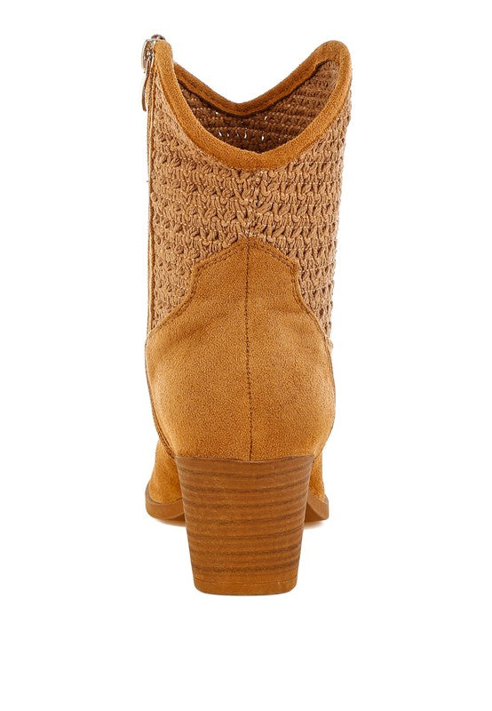 Tan ankle boot with woven design on a white background