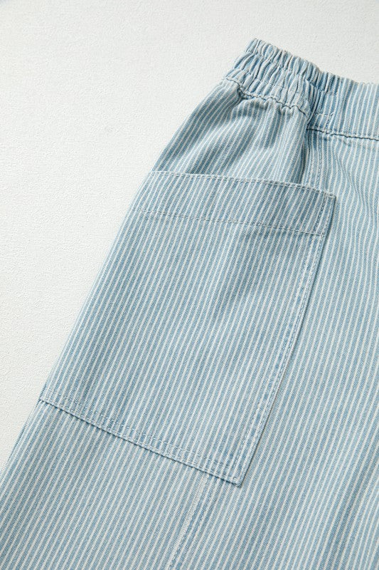 Light blue striped pants with a pocket on a light gray background