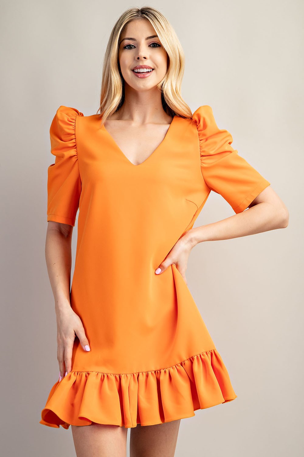 Orange mini dress with puff sleeves, straight-cut neckline, and darted bodice