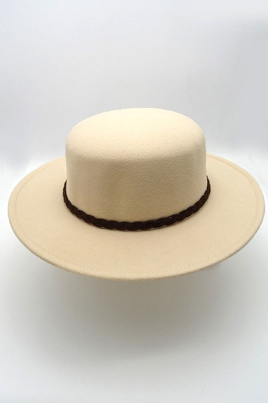 Beige straw hat with a brown band on a white background