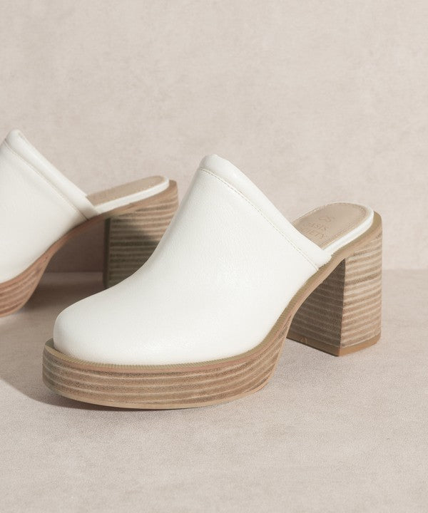 White Classic Clog with Lifted on an Inch Tall Platform and 3.5 inch Heel