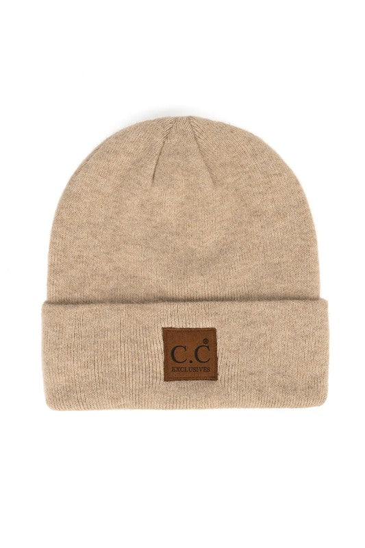 A beige heather knit unisex hat with a fold-over brim and a label with the CC brand logo on the front.