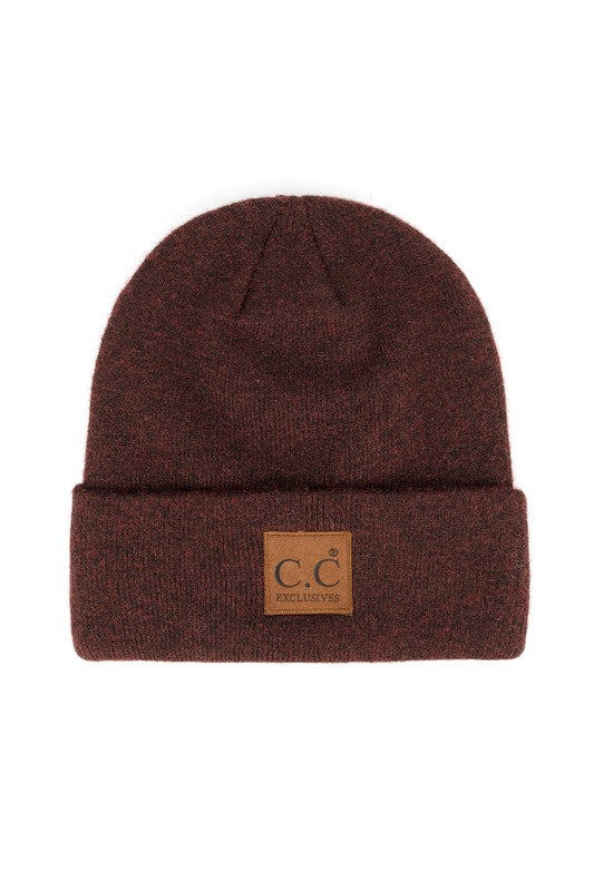 Brown beanie with a leather patch on a white background