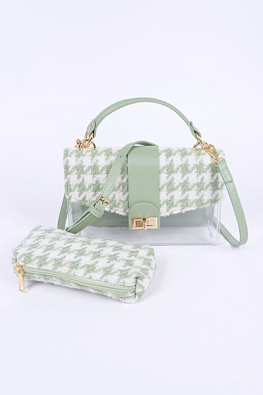 Green patterned handbag with matching pouch on a white background