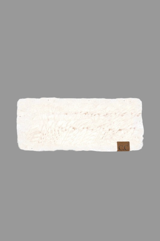 White fleece headband with a brown patch on a white background