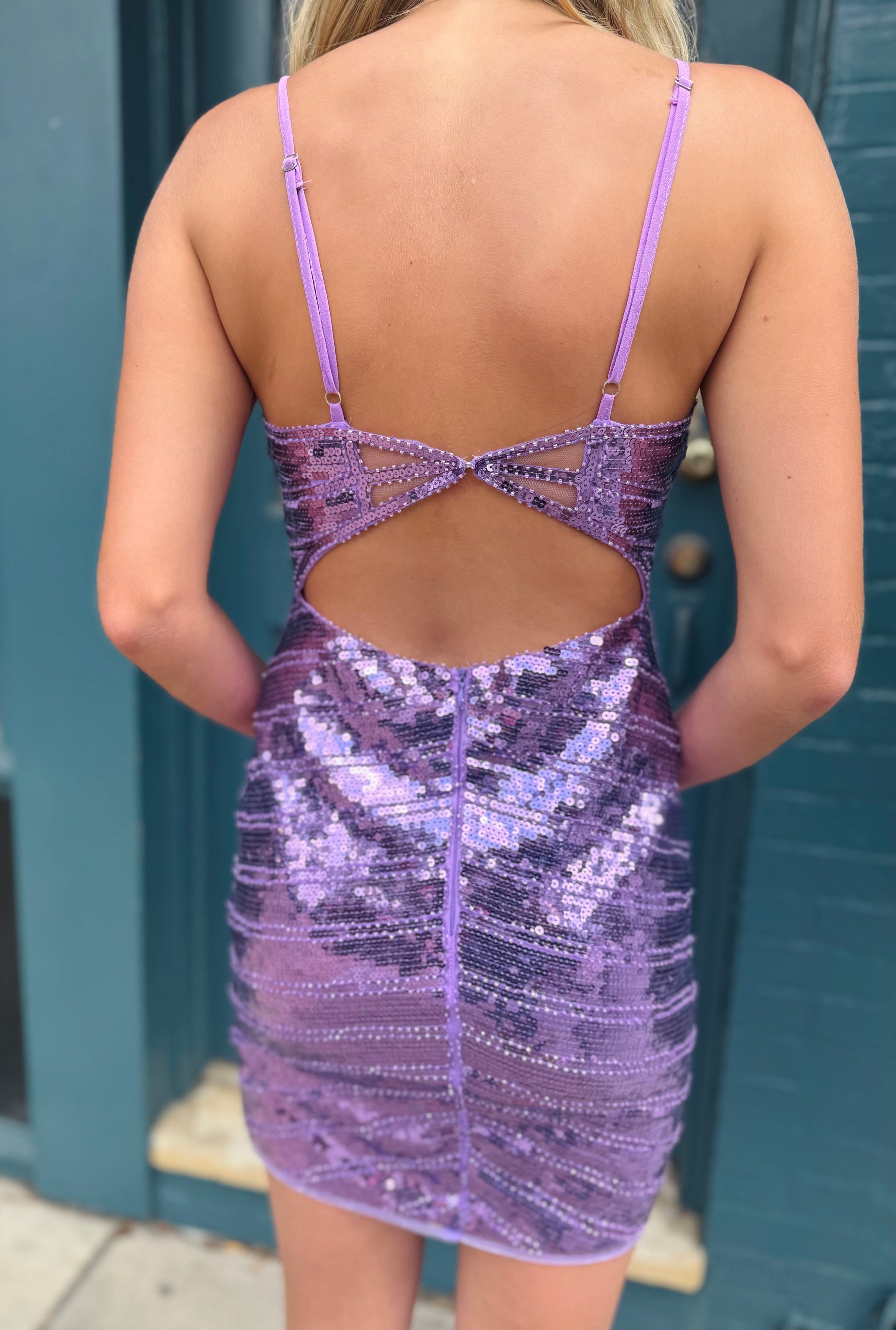 Woman in a purple sequin dress 