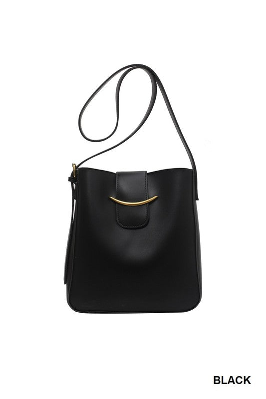 Black handbag with a gold clasp on a white background