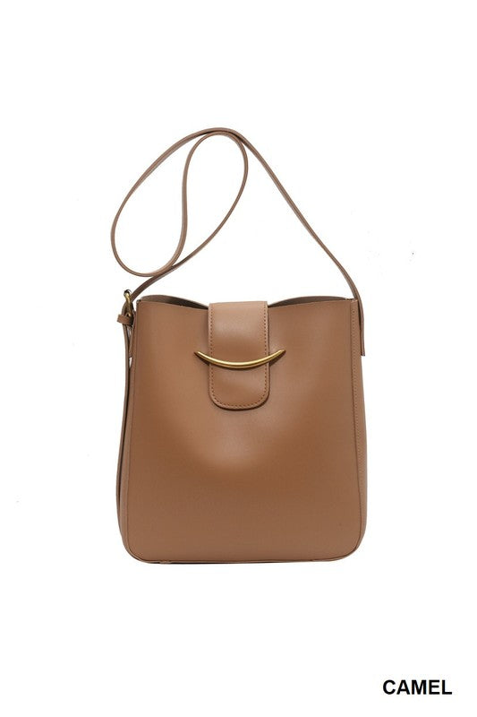 Camel handbag with a gold clasp on a white background