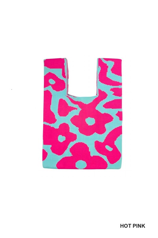 Reusable shopping bag with pink floral pattern on a white background