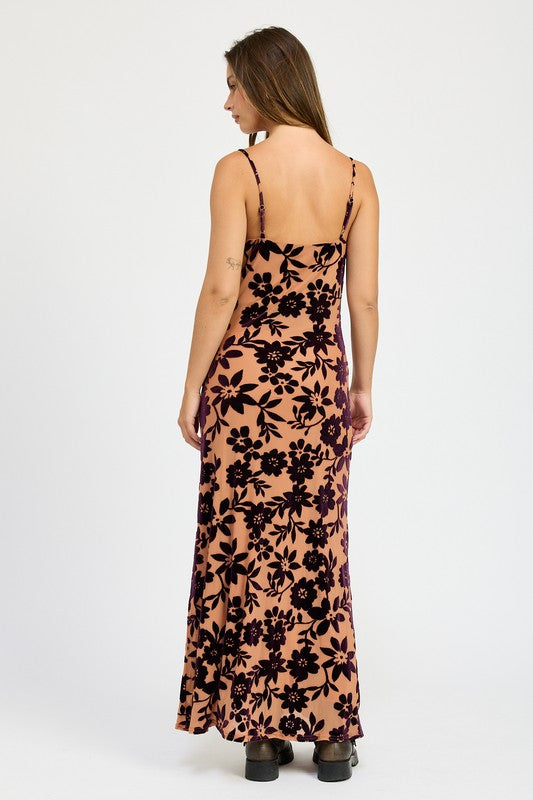 Woman wearing a floral dress with a white background