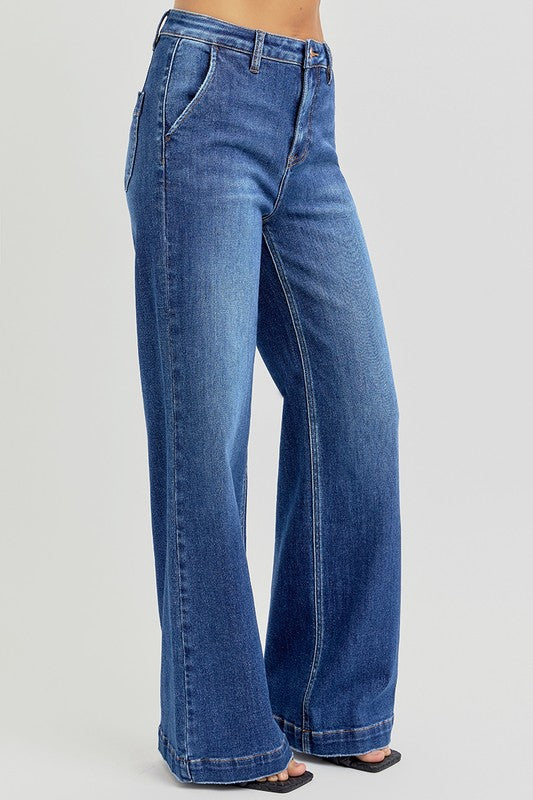 Blue jeans on a plain background