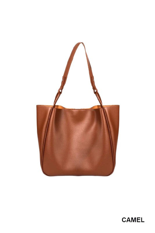 Brown leather tote bag on a white background