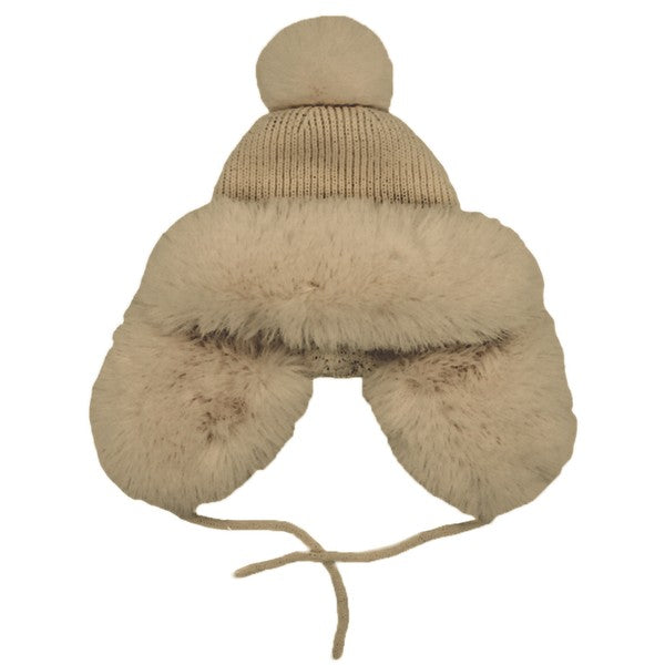 Beige winter hat with fur trim and pom-pom on a white background