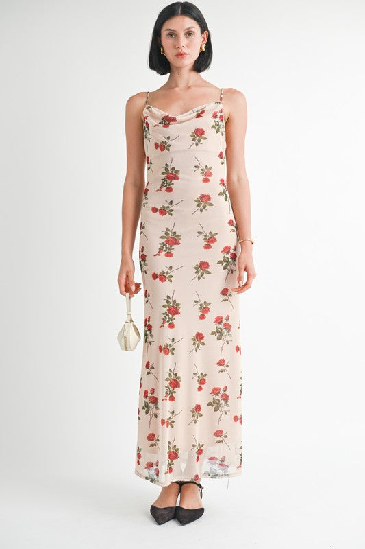 Woman wearing a floral dress on a white background