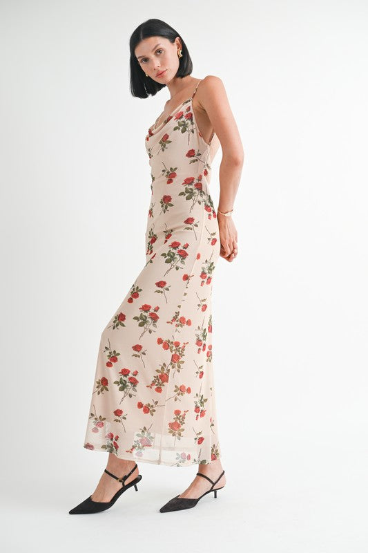 Woman wearing a floral dress on a white background