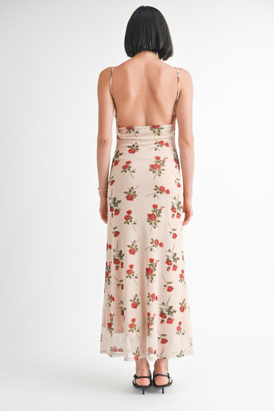 Woman wearing a floral dress with a white background
