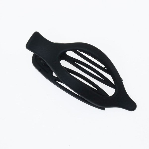 Black hair clip on a white background