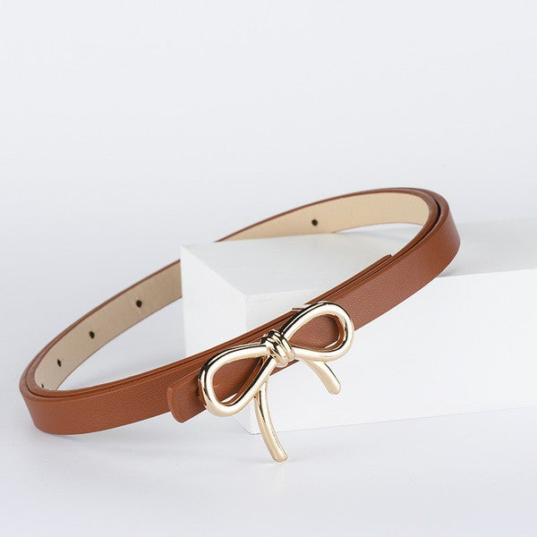Brown belt with a gold bow buckle on a white background