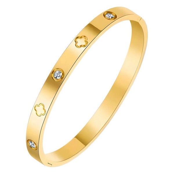 Gold bracelet with diamond accents on a white background