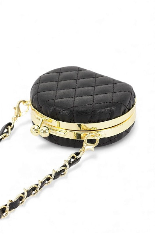 Black quilted handbag with gold chain strap on a white background