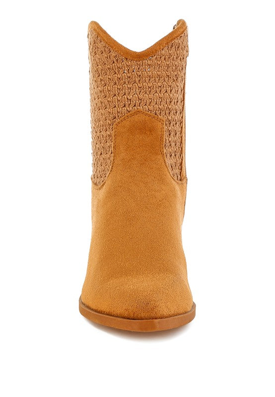 Tan cowboy boot with textured top on a white background