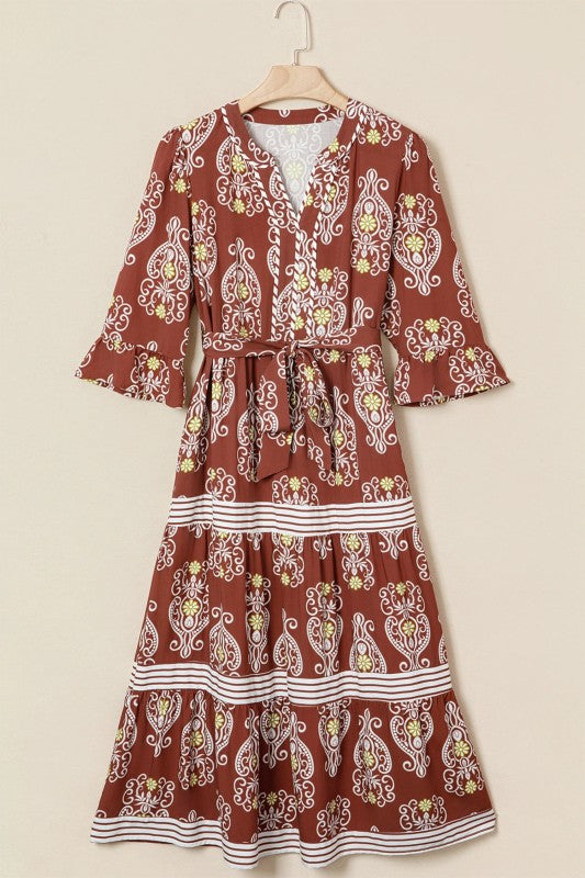 Red patterned dress on a beige background