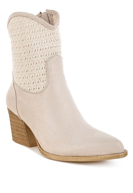 Beige ankle boot with textured top on a white background