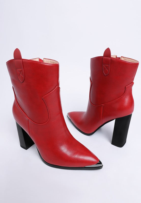 Red leather boots with black heels on a white background