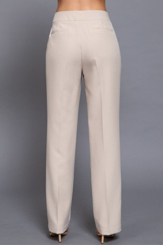 Beige pants on a gray background