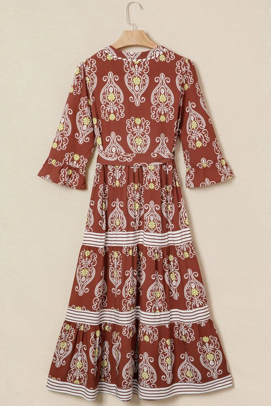 Red patterned dress on a beige background