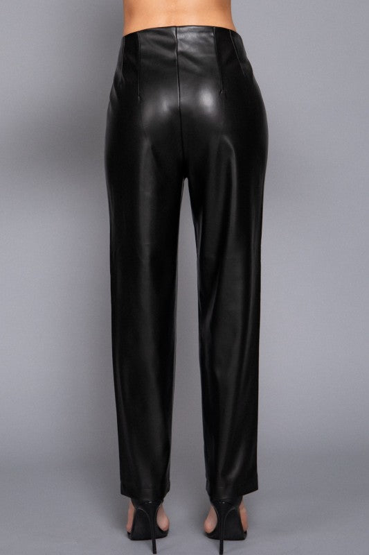 Black leather pants on a gray background