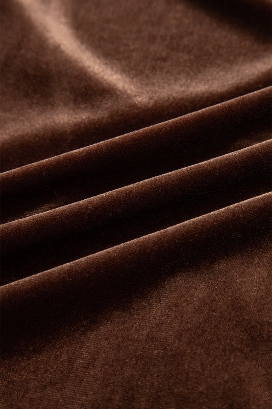 Close-up of brown fabric with folds