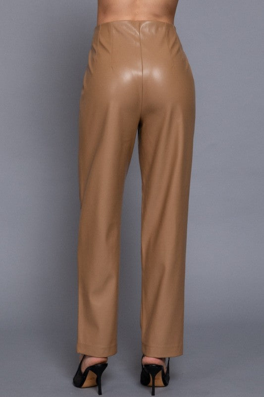 Tan leather pants on a gray background