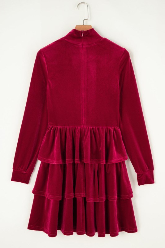 Red velvet dress with long sleeves on a white background