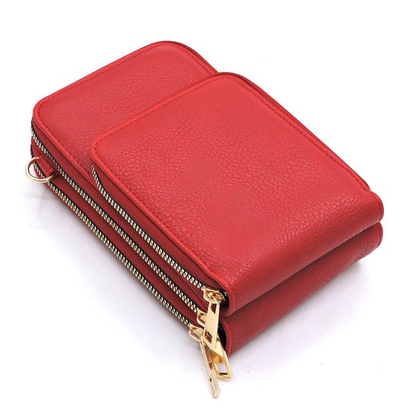 Red wallet with a gold zipper on a white background