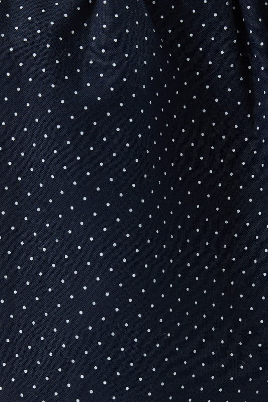 Navy blue fabric with white polka dots