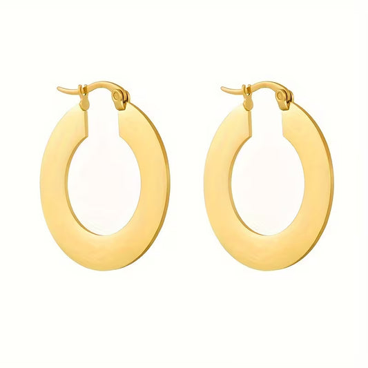 A pair of gold hoop earrings with a polished, wide oval design and lever-back closures, shown on a plain white background.