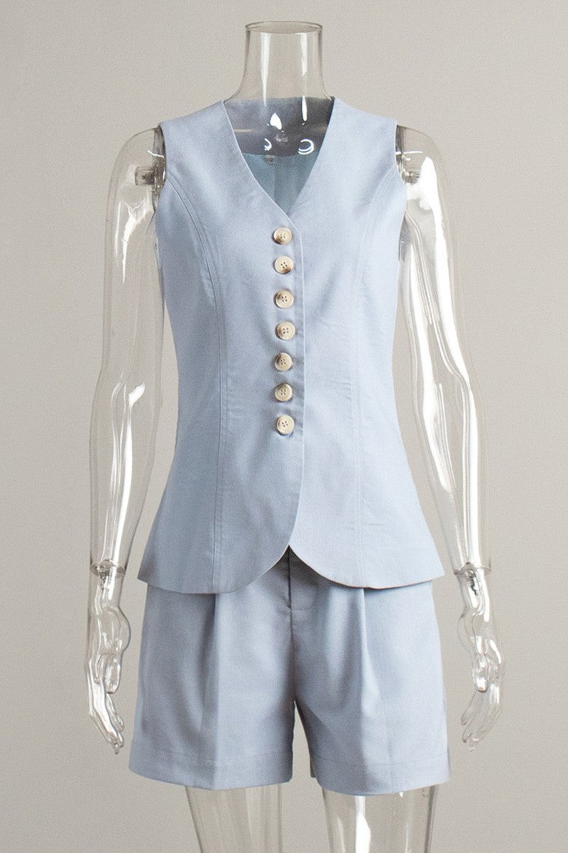 Light blue vest and shorts set on a mannequin against a gray background