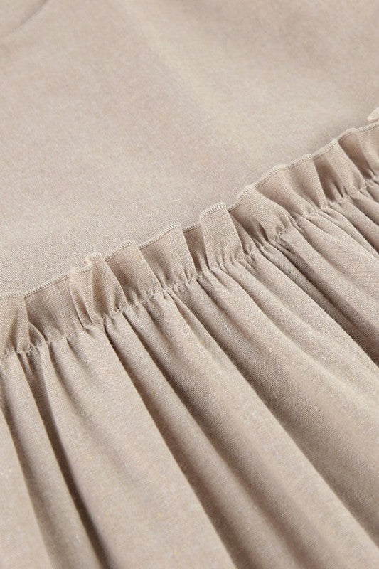 Close-up of beige fabric with a gathered edge