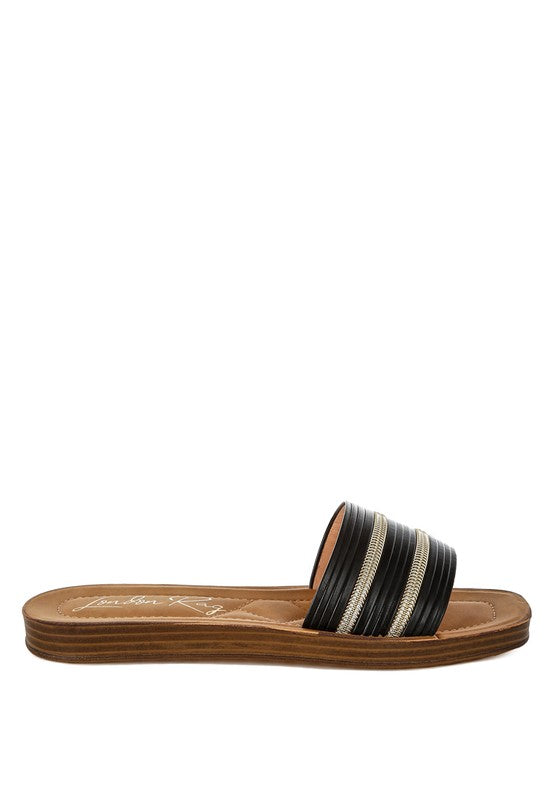 Black and brown sandal on a white background